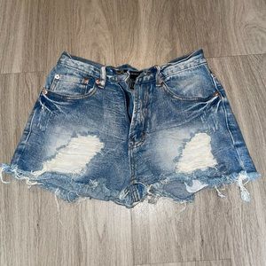 Distressed denim shorts